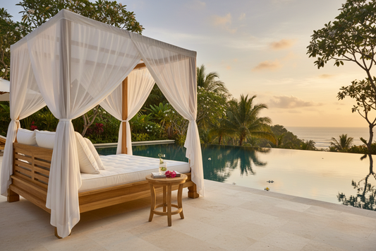 Luxury Bali outdoor teak daybed beside a tropical pool, showcasing handcrafted solid teak wood, premium craftsmanship, weather-resistant materials, and elegant Balinese outdoor design.