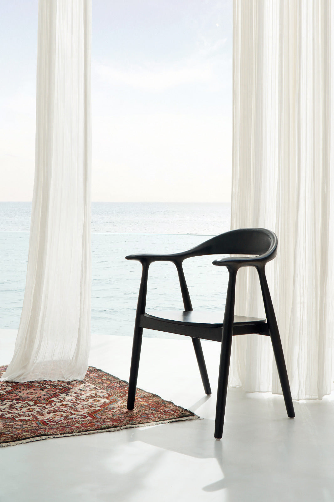 Sungkai wood armchair Roma – boho furniture, handwoven and handmade in Bali