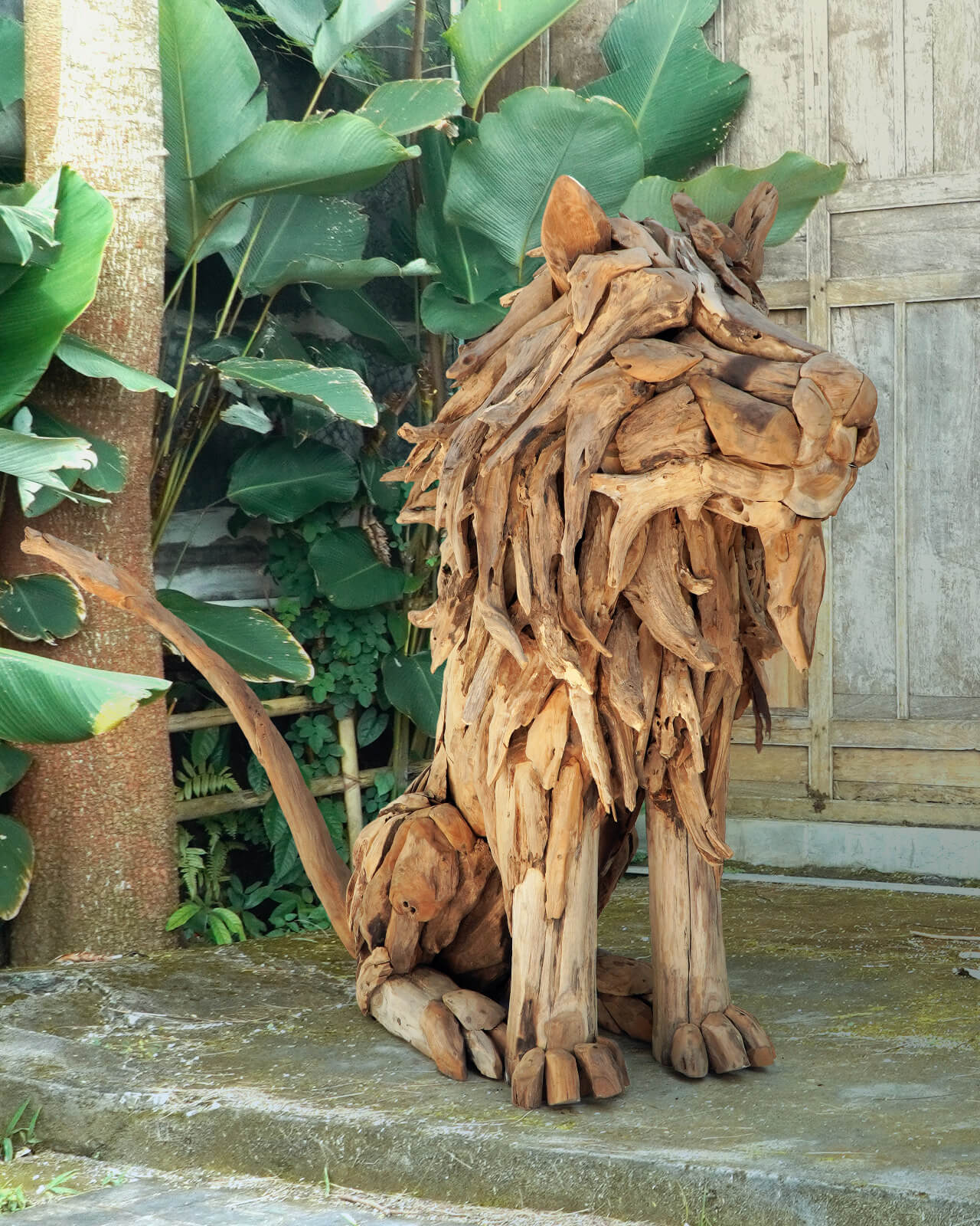 Rustic Lion Sitting Statue