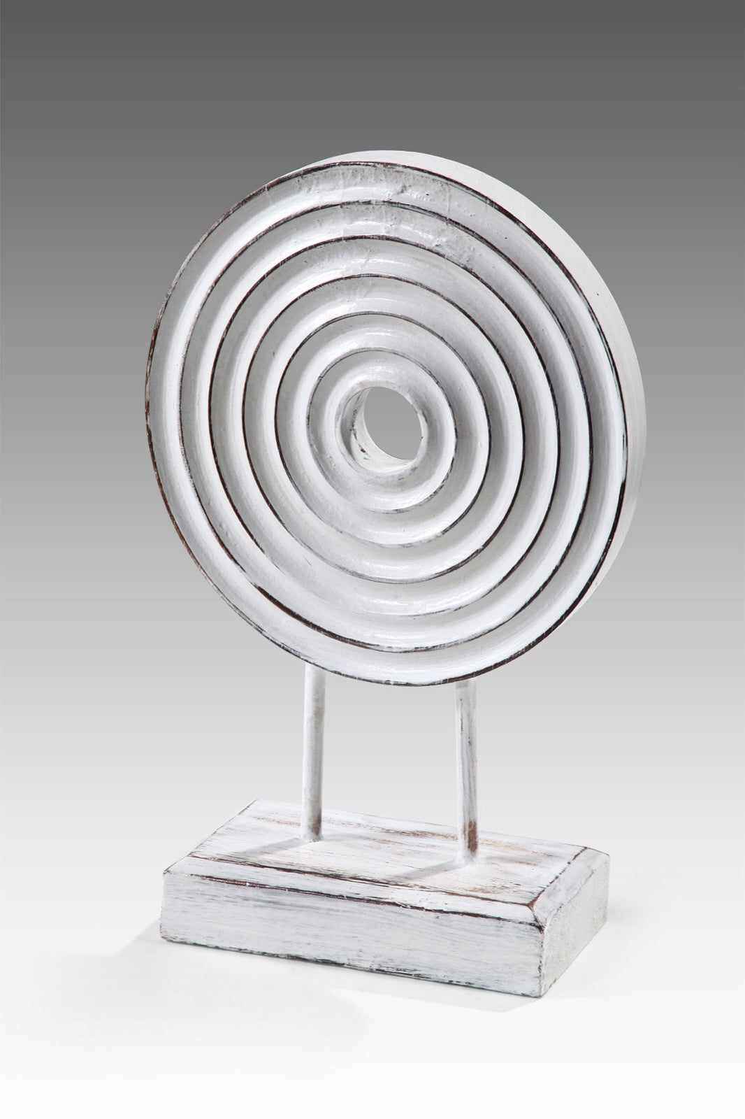 Spinning Coin decorative piece in natural materials – handmade boho decor from Bali