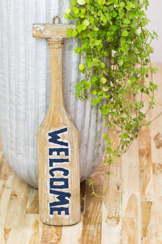 Boho albasia wood decorative paddle Small Welcome, crafted by hand in Bali