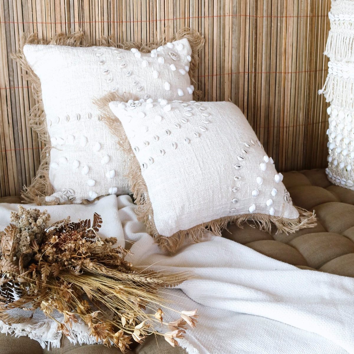 Suka Shell cushion in natural materials – handmade boho decor from Bali
