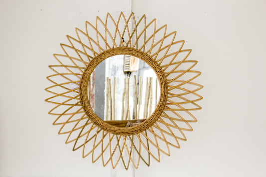 Boho natural rattan and glass mirror Sun Leaf, crafted by hand in Bali