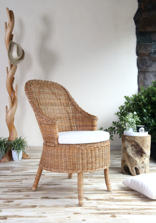Boho rattan armchair Mylla with seat cushion, crafted by hand in Bali