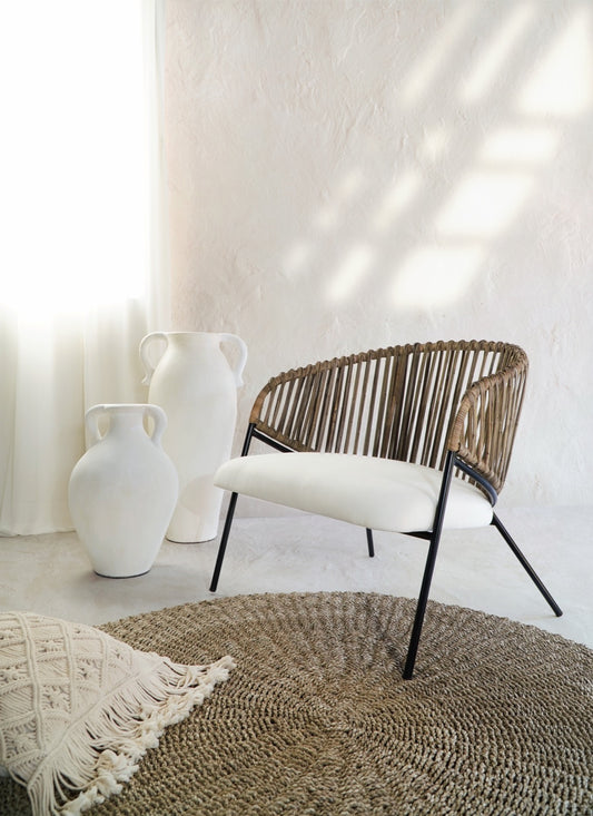 Boho rattan armchair Calypso with atbm white cushion seat, crafted by hand in Bali