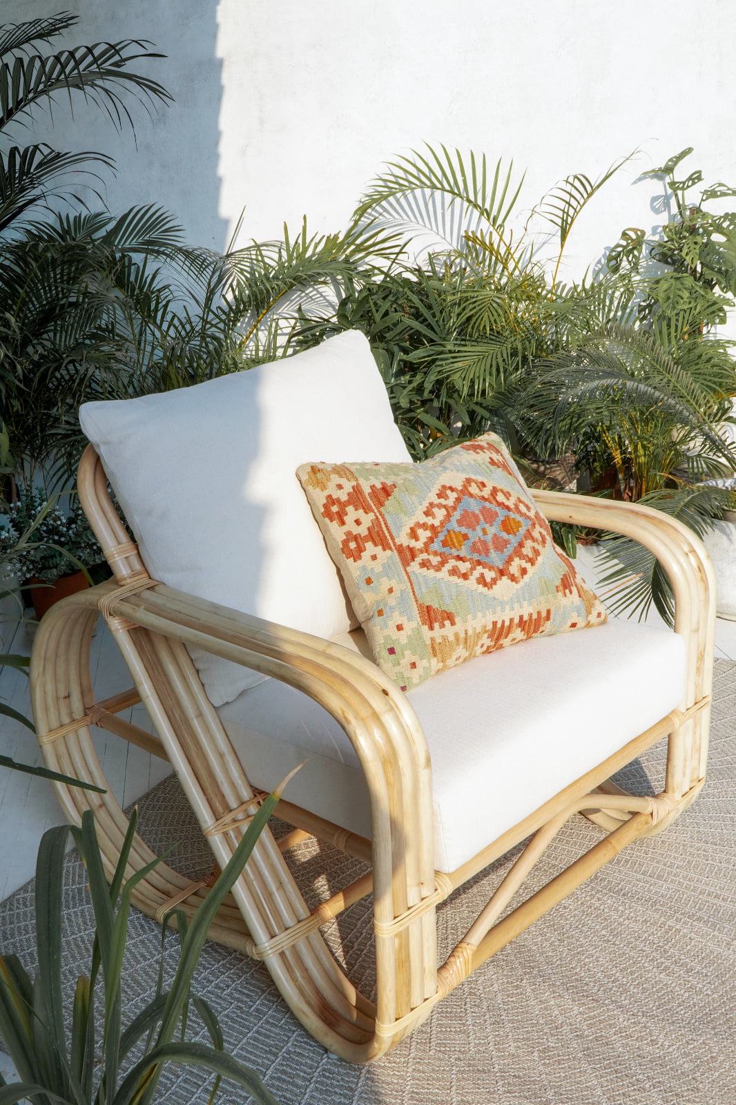 Handmade rattan armchair – the Carnation, boho furniture made in Bali