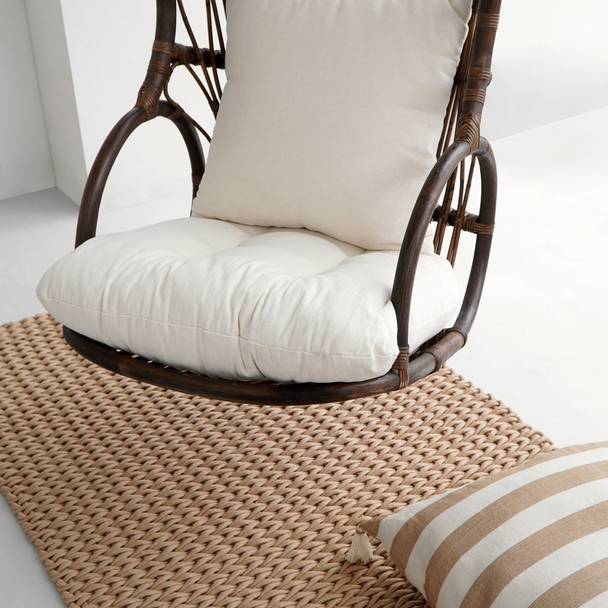 Rattan hanging chair Sergio – boho furniture, handwoven and handmade in Bali