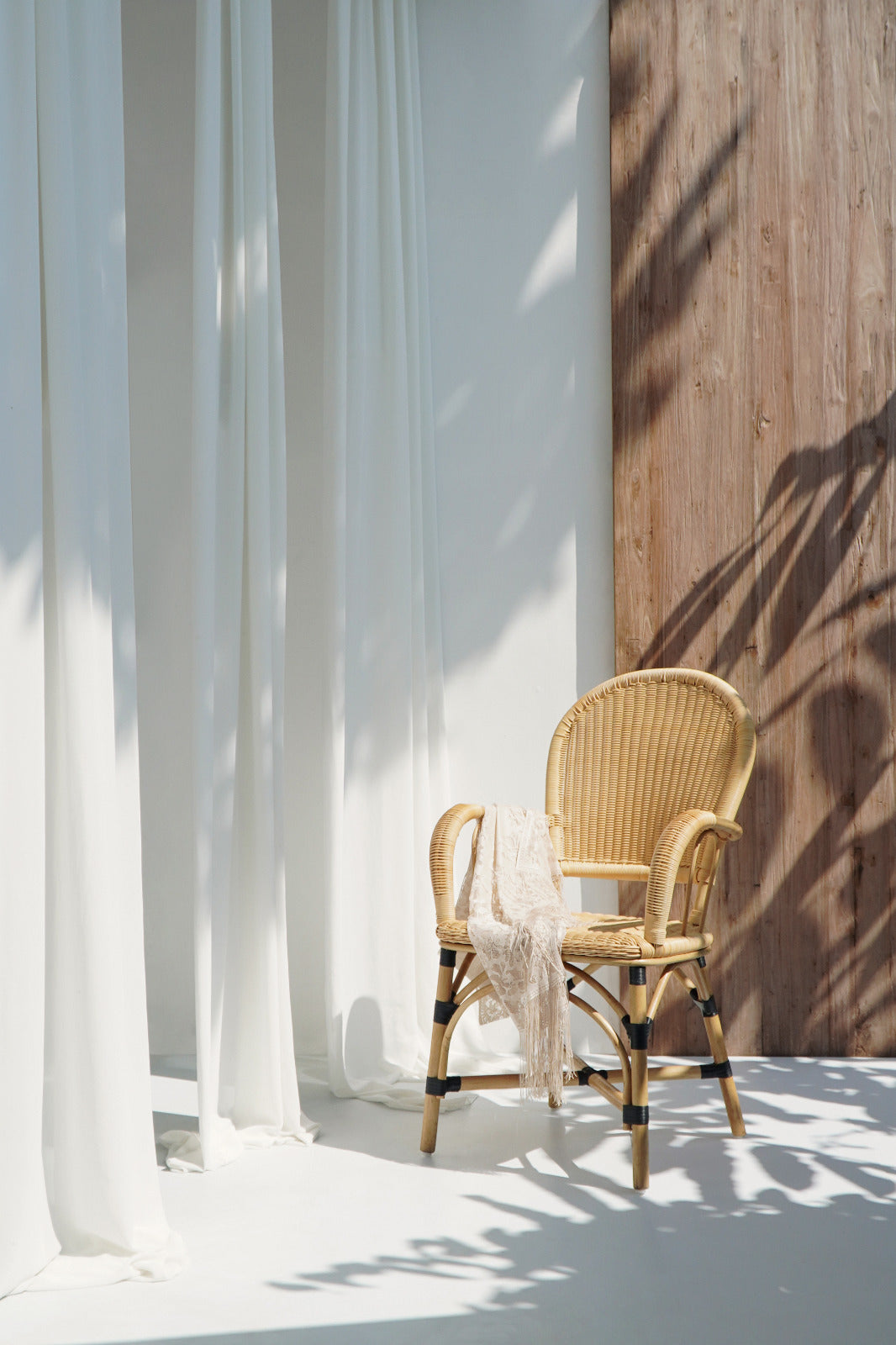 Synthetic rattan armchair – Odelia – boho furniture handmade in Bali by BaliSouk