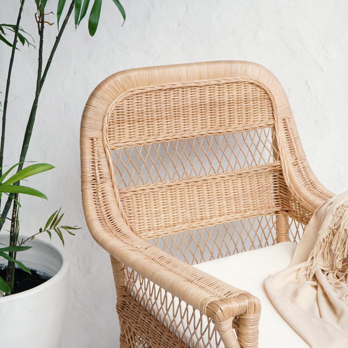 Handcrafted rattan armchair – Agam, boho furniture from BaliSouk