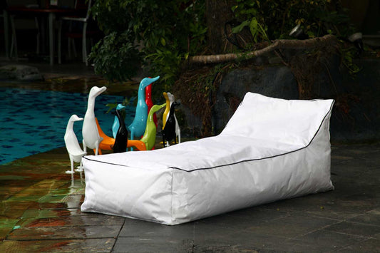 Boho fabric sun lounger Clade, handcrafted in Bali for outdoor spaces