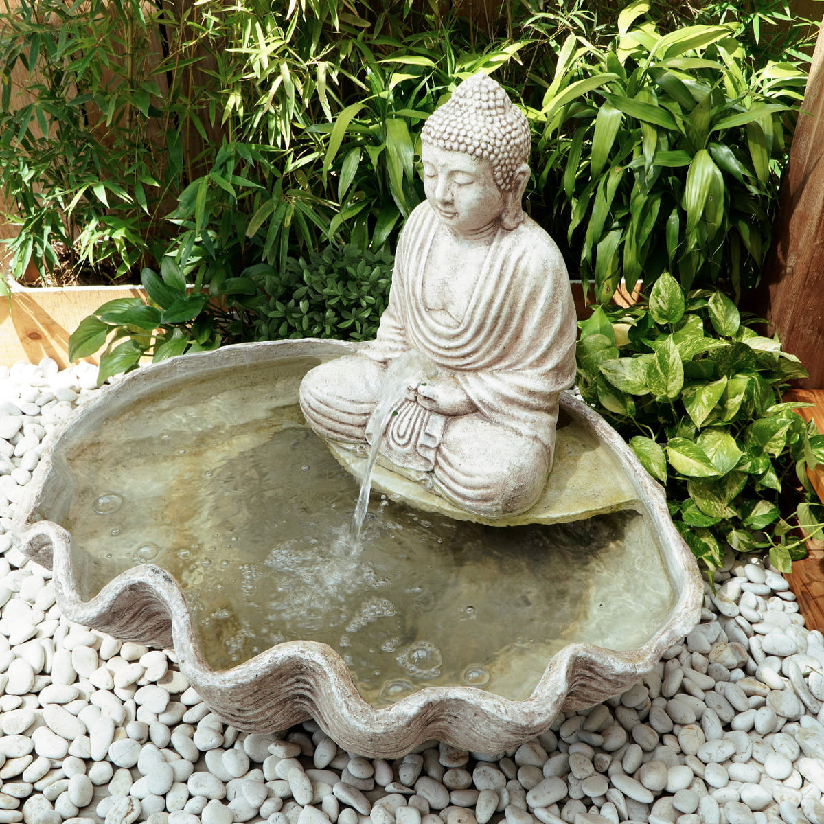 Fibre cement water fountain Buddha Shell – boho decor, handwoven and handmade in Bali